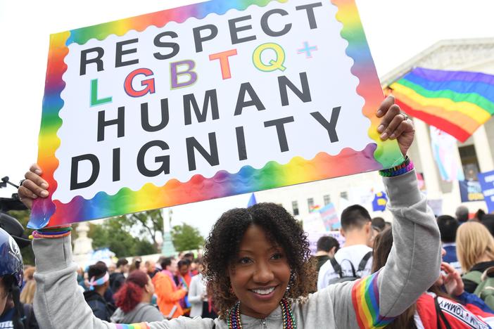 A new report by GLAAD highlights the high rate of harassment and hate facing LGBTQ users on social media. In this photo, demonstrators rally in favor of LGBTQ rights outside the U.S. Supreme Court in 2019.