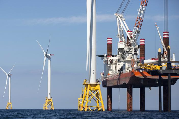 A lift boat and wind turbines off Block Island, R.I., in 2016. Approval of the country's first large-scale wind farm off Martha's Vineyard signals a major shift in the clean energy landscape.