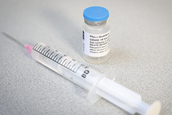 A Pfizer-BioNTech COVID-19 vaccine vial and syringe. An advisory panel to the Centers for Disease Control and Prevention has recommended that the Pfizer-BioNTech vaccine be administered to children ages 12 to 15.