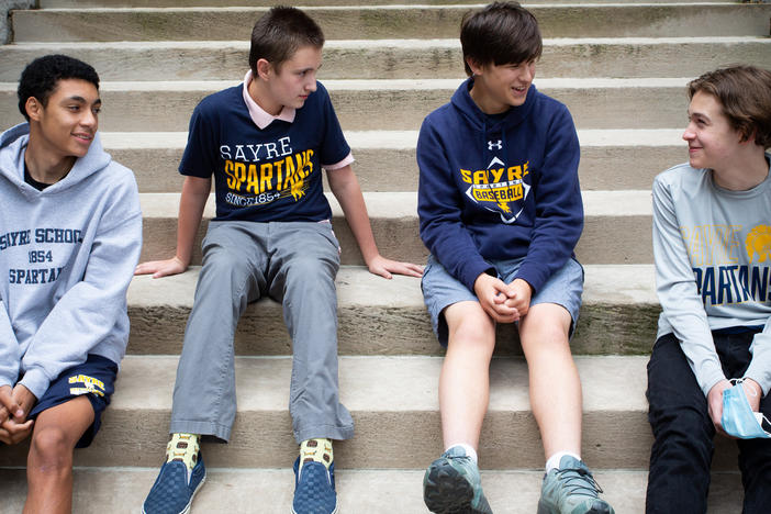 Eighth-graders Braeden Collett (left), Bo Porter, Brennan Williams and Dominique Jannat explored the "various things that get done behind the scenes" to make their campus run smoothly in their winning podcast "Whodunnit?"