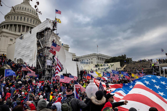 Trump supporters clash with police and security forces as people try to storm the U.S. Capitol on Jan. 6.