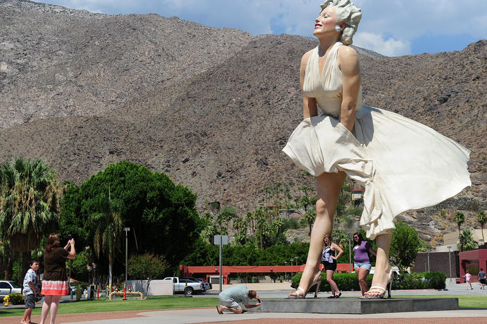The 'Forever Marilyn' statue by artist Seward Johnson was first in Palm Springs from 2012 to 2014. Now, she's headed back to the resort town permanently. But her return is sparking a backlash.