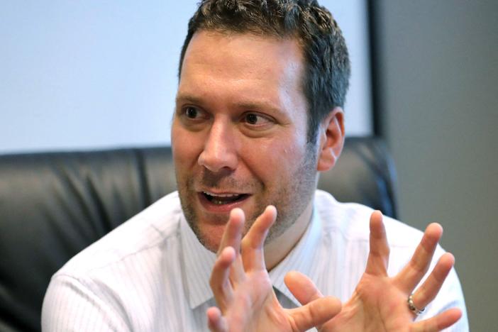 Joel Greenberg, then a Seminole County, Fla., tax collector talks to the <em>Orlando Sentinel</em> during a September 2019 interview at his office in Lake Mary, Fla.