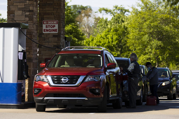 Customers wait in line to fill up their tanks this week at a Costco gas station in Nashville, Tenn. It will take several days for the supply chain of fuel to return to normal even after Colonial Pipeline said it had brought its entire pipeline system back into operation.