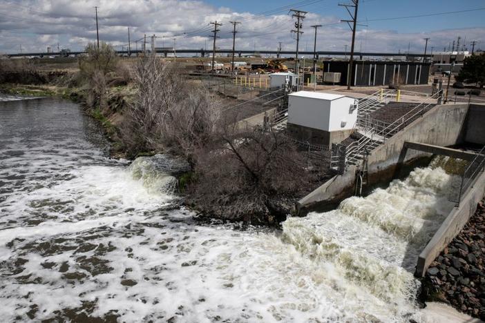 Treated Denver wastewater flows into the South Platte River in April. In what may be the largest U.S. project of its kind, Denver will use excess energy from sewage wastewater to heat and cool a new agriculture, arts and education center.