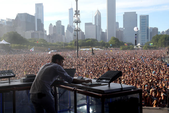 Electronic artist Flume performs at Lollapalooza in 2016. The festival is set to return at full capacity this summer.
