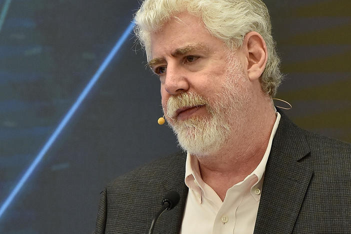 Bob Garfield speaks onstage at a 2016 event.