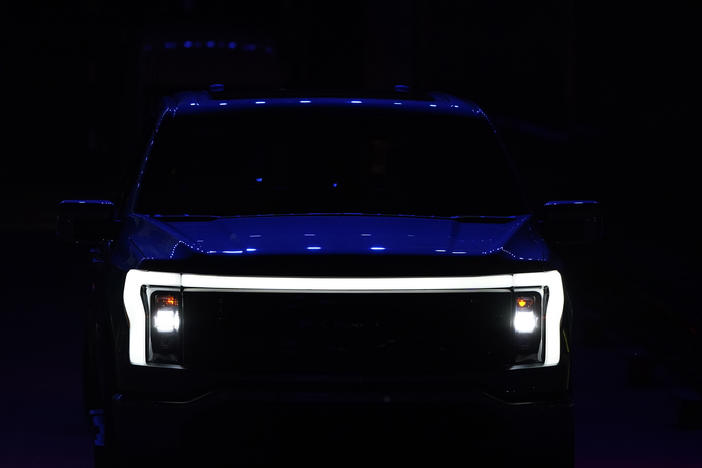 Pictured is the front grill of the new Ford F-150 Lightning unveiled on Wednesday in Dearborn, Mich. The electric version of Ford's bestselling pickup truck marks a major push to get buyers to switch to electric vehicles.