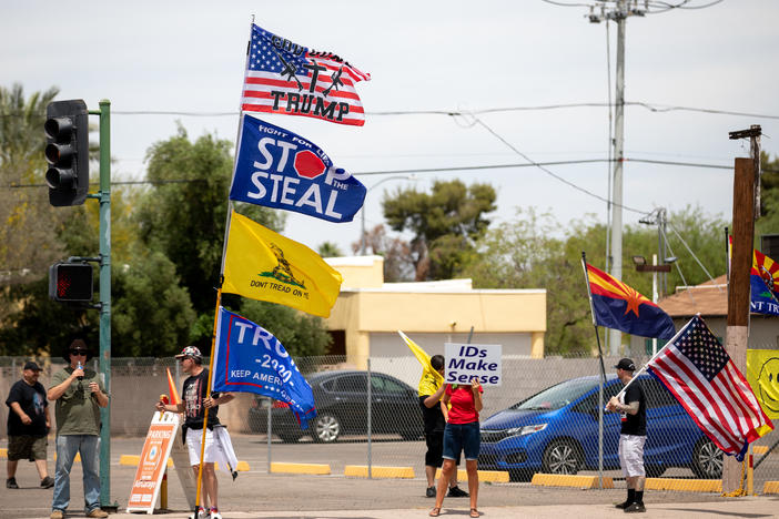 Demonstrators in support of former President Donald Trump gather on May 1 outside the Arizona Veterans Memorial Coliseum in Phoenix, where a controversial 2020 general election review was set to begin. Trump has heartily supported the audit.
