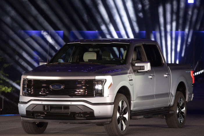 Ford unveils its new all-electric F-150 Lightning pickup Wednesday at Ford World Headquarters in Dearborn, Mich. The truck will come with a price tag that starts at just under $40,000.