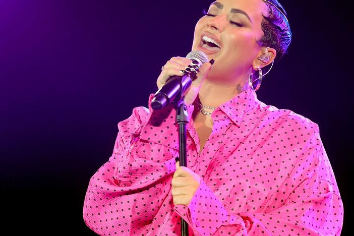 Demi Lovato performs during a premiere event for their documentary <em>Demi Lovato: Dancing With The Devil</em>.
