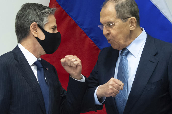 U.S. Secretary of State Antony Blinken (left) greets Russian Foreign Minister Sergey Lavrov as they arrive for a meeting at the Harpa Concert Hall in Reykjavik, Iceland, on Wednesday.