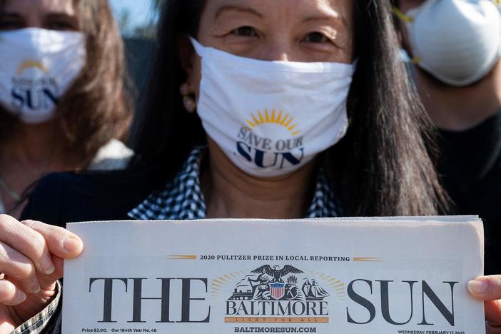 <em>Baltimore Sun</em> reporter Jean Marbella participates in a Save Our Sun rally in March, part of an effort to secure an alternative buyer to Alden Global Capital.