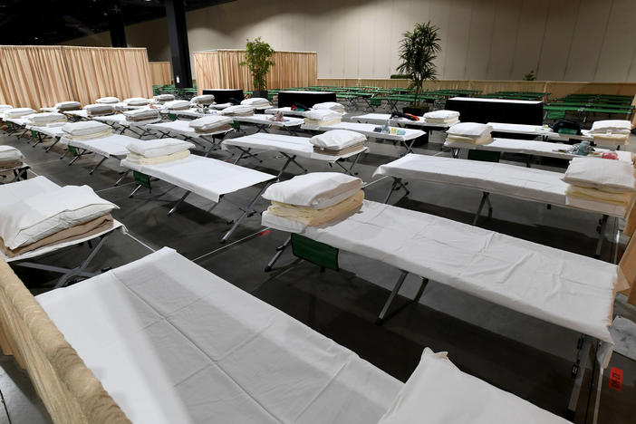 Sleeping quarters set up for migrant children are shown during a tour of the Long Beach Convention Center on April 22. Long Beach officials and officials with the U.S. Department of Health and Human Services led the tour.