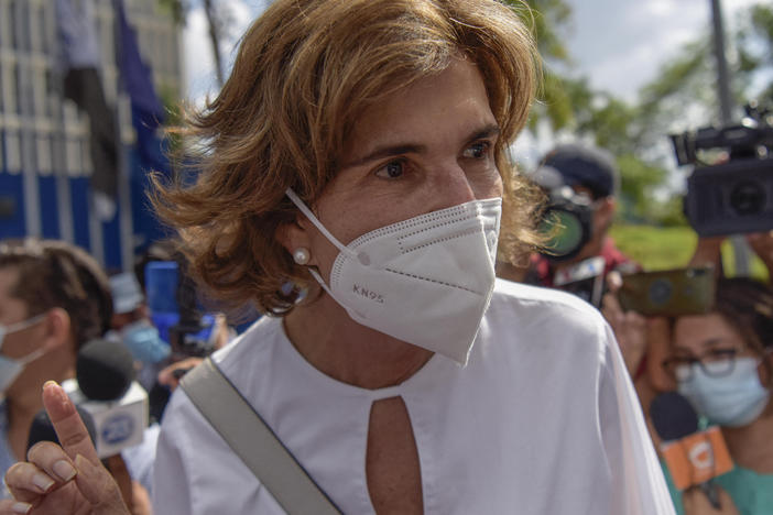 Cristiana Chamorro is seen outside Nicaragua's Ministry of the Interior after being accused of money laundering on Thursday. She has said she'll run against President Daniel Ortega in this year's presidential election.