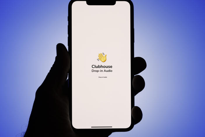 The Clubhouse logo is seen on an iPhone screen in this photo illustration. A Clubhouse room has become a place where Palestinians and Israelis speak openly about the conflict in Gaza.