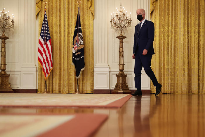 President Biden has slapped new sanctions on Russia over hacking and election interference but is aiming for a more predictable relationship. He plans to meet his counterpart next month.