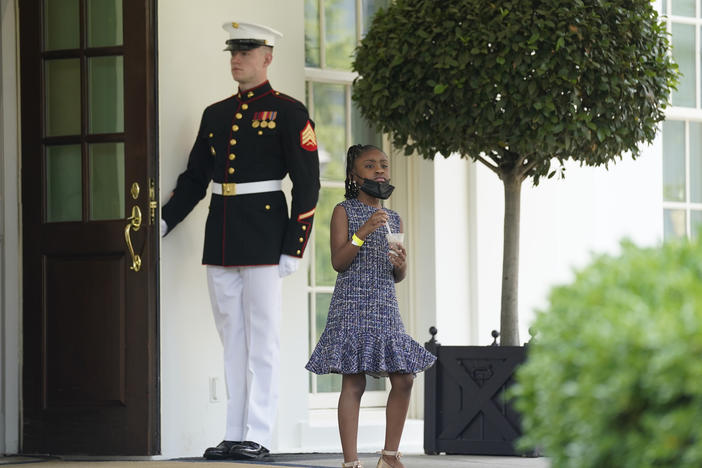 Gianna Floyd, George Floyd's daughter, walks out of the West Wing door at the White House after meeting Tuesday with President Biden and Vice President Harris.