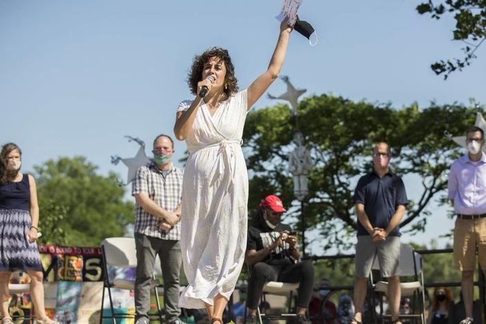 Minneapolis City Council Member Alondra Cano speaks to a crowd that gathered at Powderhorn Park last June. During the event, Cano and eight other Minneapolis City Council members declared their commitment to defunding and dismantling the Minneapolis Police Department. But their support has changed since then.