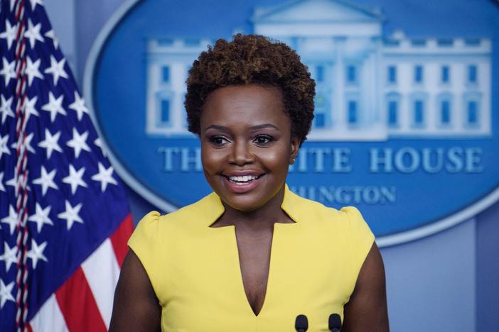 White House principal deputy press secretary Karine Jean-Pierre arrives for the press briefing Wednesday. "I believe being behind this podium, being in this room, being in this building, is not about one person," she said of the historic nature of her turn in the briefing room.