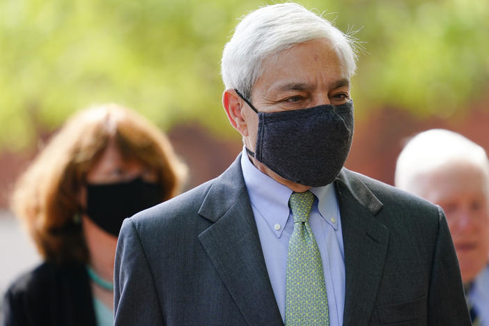 Former Penn State President Graham Spanier walks from the Dauphin County Courthouse in Harrisburg, Pa., after a hearing on Wednesday. A judge said Spanier must report to jail on July 9 to begin serving at least two months for endangering the welfare of children.