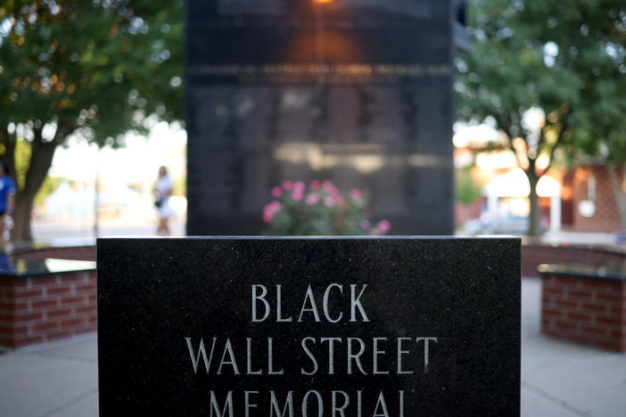 The Black Wall Street Memorial last year in Tulsa, Okla. President Biden visited Tulsa on Tuesday for the 100th anniversary of an attack that left as many as 300 people dead.