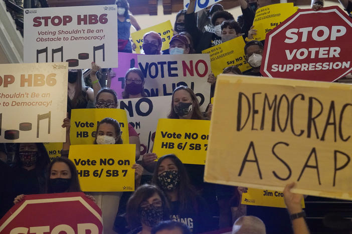In this May 6, 2021 file photo, a group opposing new voter legislation gather outside the House Chamber at the Texas Capitol in Austin. Texas Republicans dug in Saturday, for a final weekend vote on some of the most restrictive new voting laws in the U.S., finalizing a sweeping bill.