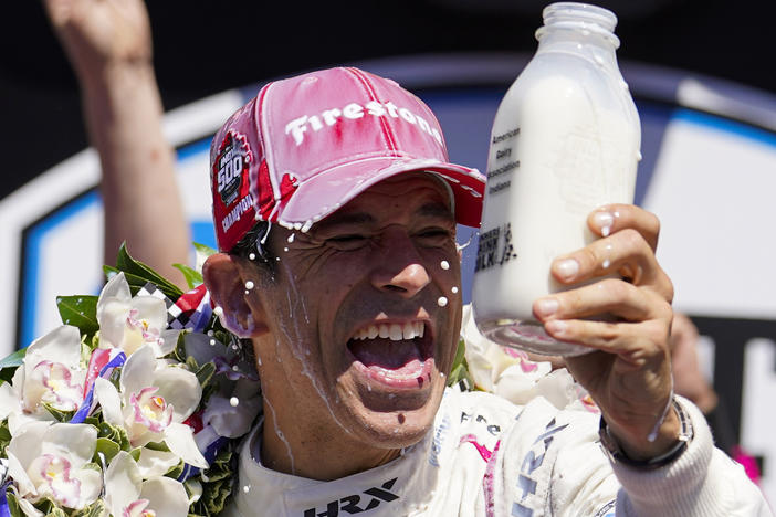 Helio Castroneves won his fourth Indianapolis 500 race Sunday, becoming the fourth racer in history to do so.