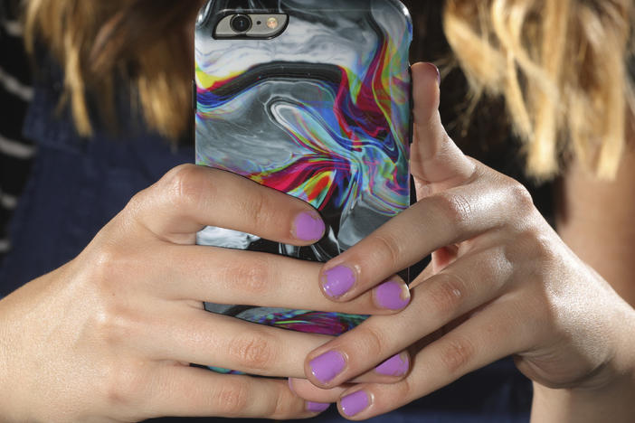Parents and tech companies are both struggling with how to handle underage kids using social media apps.