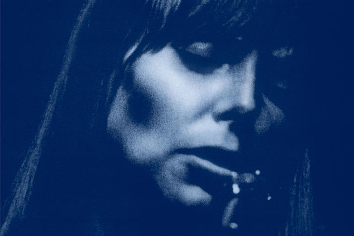 Joni Mitchell on the cover of <em>Blue</em>, an album turning 50 in 2021.