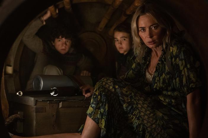Marcus (Noah Jupe), Regan (Millicent Simmonds) and Evelyn (Emily Blunt) brave the unknown in <em>A Quiet Place Part II.</em>