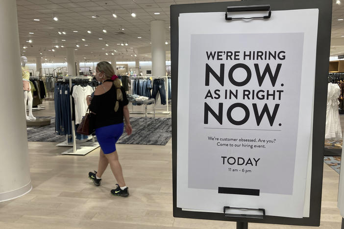 A Nordstrom store is looking for employees last month in Coral Gables, Fla. Citing a severe shortage of workers, half of the nation's governors have decided to end extra federal jobless benefits months early.