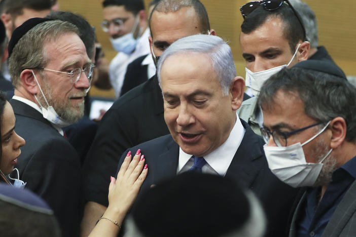 Israeli Prime Minister Benjamin Netanyahu looks on after a special session of the Knesset, Israel's parliament, elected a new state president on Wednesday.