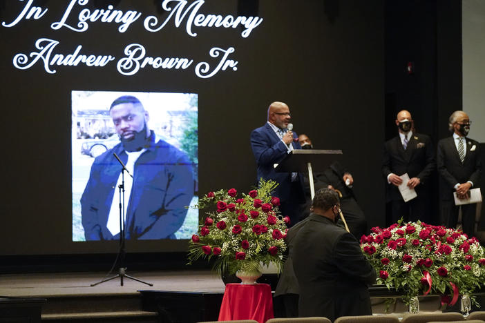 A photo of Andrew Brown Jr. is seen during his funeral, on May 3, in Elizabeth City, N.C. Brown was fatally shot by Pasquotank County Sheriff deputies trying to serve a search warrant.
