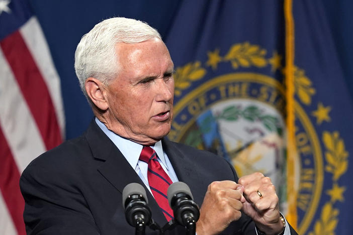 Former Vice President Mike Pence addresses the annual Hillsborough County Lincoln-Reagan Dinner on Thursday night in Manchester, N.H. He called Jan 6 "a dark day" in the history of the U.S. Capitol.