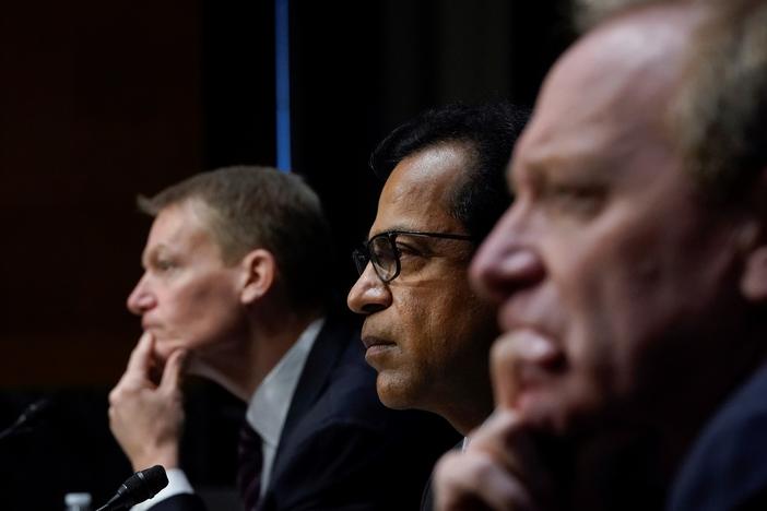 FireEye CEO Kevin Mandia, SolarWinds CEO Sudhakar Ramakrishna and Microsoft President Brad Smith testify during a Senate Intelligence Committee hearing on Capitol Hill on Feb. 23, in Washington, D.C. The hearing focused on the 2020 cyberattack that resulted in a series of data breaches within several agencies and departments in the U.S. federal government.