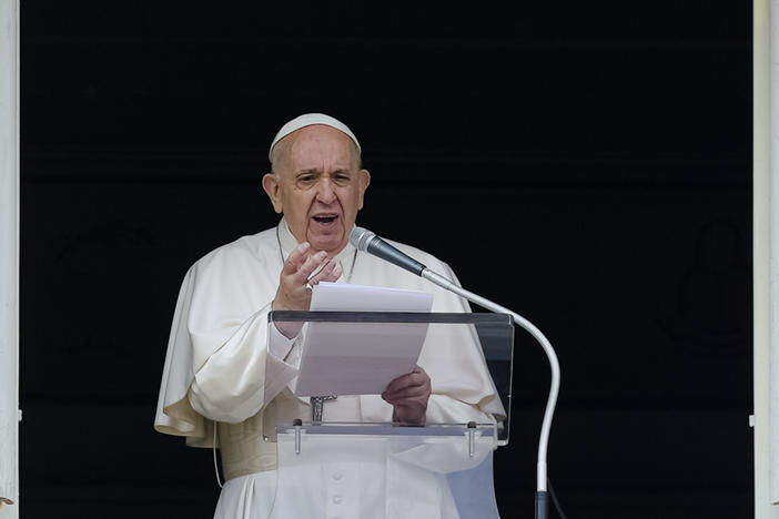 Pope Francis speaks from the window of his studio overlooking St. Peter's Square on Sunday. Francis expressed sorrow for the treatment of Indigenous people in Canada, but did not offer an apology.