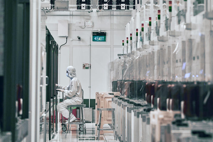 A technician works at a semiconductor fabrication facility in Singapore.