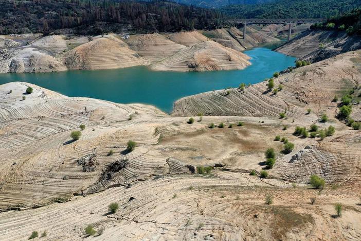 Warmer temperatures are leading to emptier reservoirs across the West, such as Lake Oroville in Northern California.