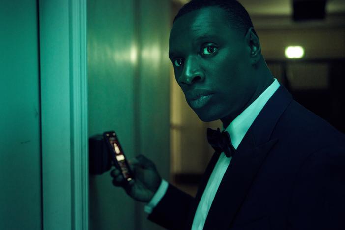 Omar Sy stars as a shapeshifting thief in the Netflix series <em>Lupin</em>.