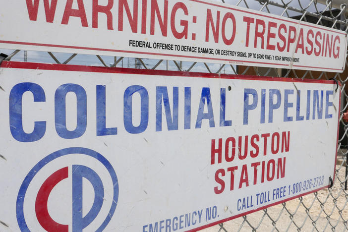 A sign at the Colonial Pipeline Houston Station facility in Pasadena, Texas, warns against trespassing. Colonial was forced to shut down a key pipeline last month after suffering a ransomware attack. Such attacks are becoming more frequent and increasingly, they are targeting key infrastructure like fuel or food supplies.