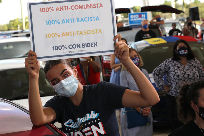 A Joe Biden supporter attends a drive-in voter mobilization event in Miramar, Fla., on Oct. 13, 2020. Democrats lost Florida because they failed to engage and target their message to the Latino community, says Quentin James, president of The Collective PAC.