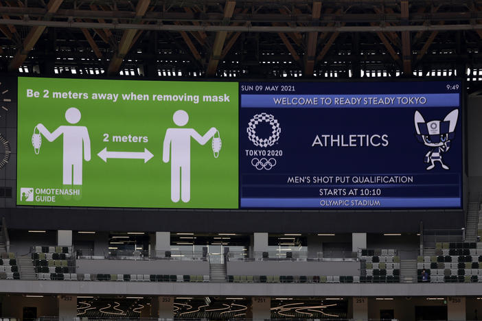 Signs on a screen are shown before an athletics test event for the Tokyo 2020 Olympic Games last month at the National Stadium in Tokyo.