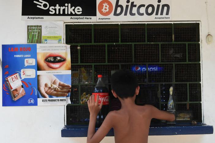 A sign at a store in El Zonte, El Salvador, advertises that it accepts bitcoins for payment.