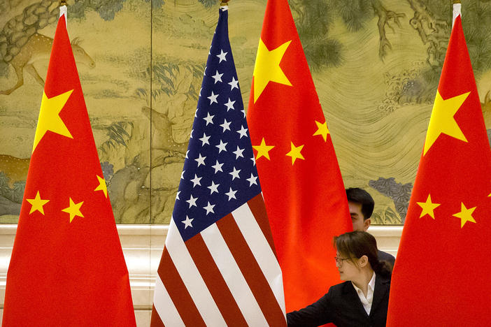 U.S. and Chinese flags before the opening session of 2019 trade negotiations between U.S. and Chinese trade representatives in Beijing. China just passed a sweeping law designed to counter sanctions the U.S. and the European Union have imposed on Chinese officials and major Chinese companies.