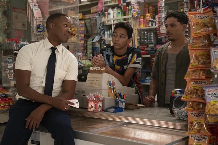 Benny (Corey Hawkins), Sonny (Gregory Diaz IV) and Usnavi (Anthony Ramos) chat in Usnavi's Washington Heights bodega<em>.</em>