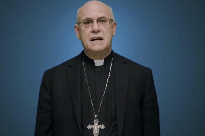 In this photo taken from video, Bishop Kevin Rhoades of Fort Wayne-South Bend, Ind., head of the doctrine committee for the U.S Conference of Catholic Bishops, addresses the body's virtual assembly regarding a formal statement on the meaning of the Eucharist in the life of the church on Thursday.