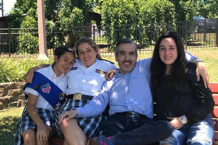 Lucio Arreola and his daughters Lucia (from left), Paulina and Maria.