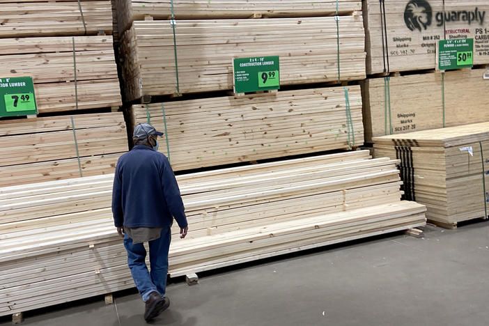 Stacks of lumber are offered for sale at a home center in April in Chicago.