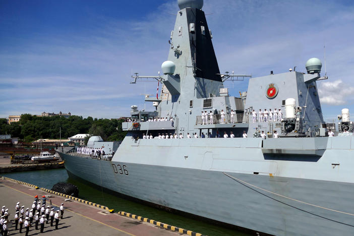 The British Royal Navy destroyer HMS Defender in the port of Odessa, Ukraine, on Tuesday. Russia said it fired warning shots at the warship Wednesday when it entered territorial waters off Crimea.
